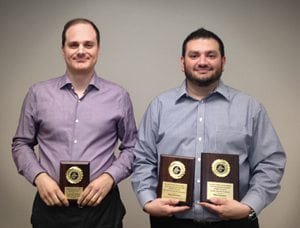 Managing Editor George Saliba (left) and Art Director Mike Sanchez proudly display their Garden State Journalists Association awards.